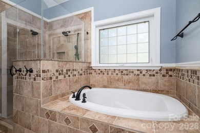 Welcome to this beautifully maintained home nestled on just over - photo 34