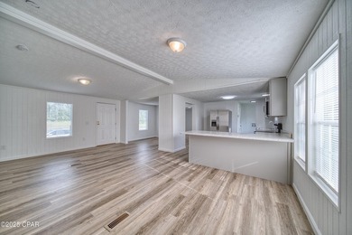 This beautifully renovated 3-bedroom, 2-bathroom home is packed - photo 6