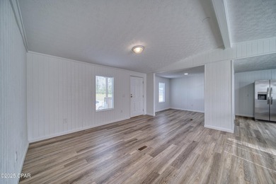 This beautifully renovated 3-bedroom, 2-bathroom home is packed - photo 10