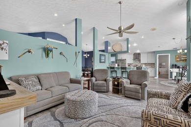 Palm trees sway over your private, screened pool at this move-in - photo 12