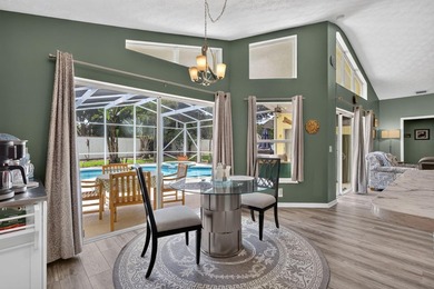 Palm trees sway over your private, screened pool at this move-in - photo 18