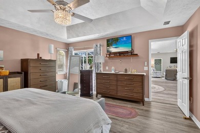 Palm trees sway over your private, screened pool at this move-in - photo 20