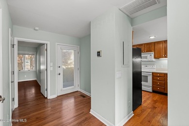 Welcome to this stunning 3-bedroom, 2-bathroom townhouse located - photo 3