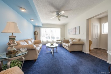Deceptive from the outside, this expanded Colonial home offers - photo 6