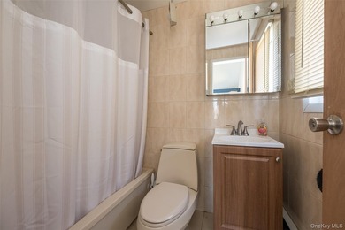 Deceptive from the outside, this expanded Colonial home offers - photo 9
