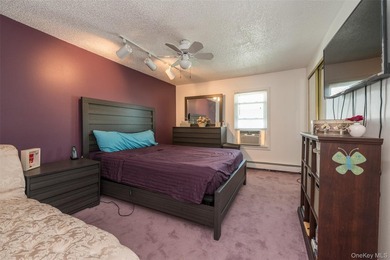Deceptive from the outside, this expanded Colonial home offers - photo 10