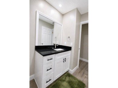 Beautifully renovated and move-in ready, this spacious 3-bedroom - photo 32
