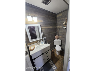 Discover this beautiful 3 bedroom, 2.5 bathroom LAKEFRONT home - photo 13