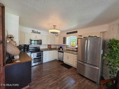 Discover this beautiful 3 bedroom, 2.5 bathroom LAKEFRONT home - photo 25