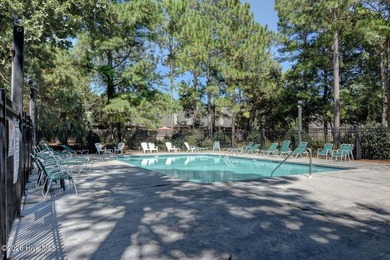 Enjoy easy living in this brick townhome located in the - photo 31