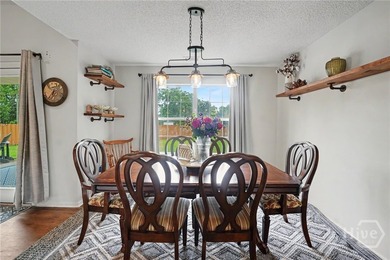 This thoughtfully updated and maintained 4-bedroom ranch sits on - photo 12