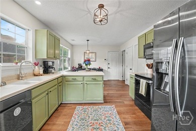 This thoughtfully updated and maintained 4-bedroom ranch sits on - photo 13