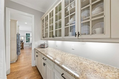 Located in the highly sought-after gated community of Cramer - photo 9