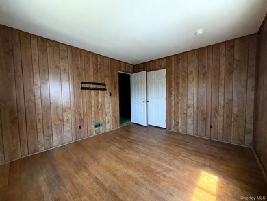This 3 bedroom, 1 bathroom split level offers a living room - photo 11