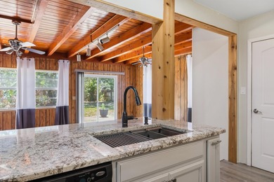 This inviting 2-bedroom, 2-bath Lakewood Park home blends - photo 12