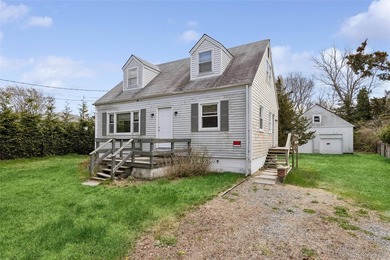 Welcome to 56 Inlet Rd W, a charming two-story cape home nestled - photo 2