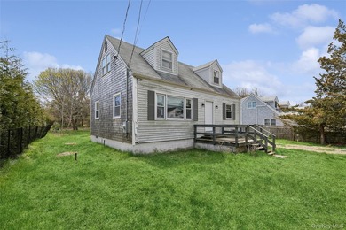 Welcome to 56 Inlet Rd W, a charming two-story cape home nestled - photo 3