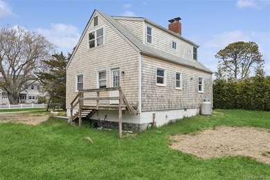 Welcome to 56 Inlet Rd W, a charming two-story cape home nestled - photo 4