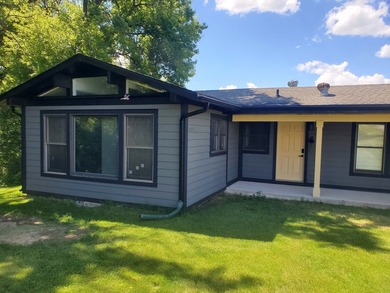 Freshly remodeled 3-bedroom, 1.5-bath ranch-style home situated - photo 2
