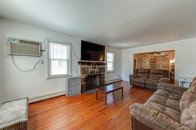 Welcome to this spacious four-bedroom, two-bath home nestled in - photo 2