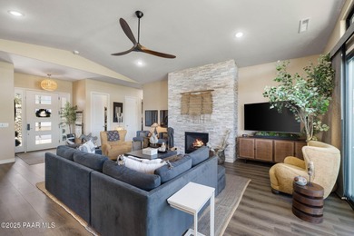 Discover this masterfully upgraded, lightly lived-in gem where