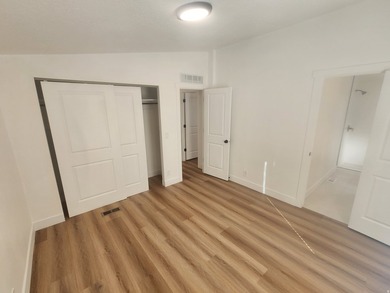 Recently remodeled! New cabinets! New flooring! New bathrooms! - photo 11