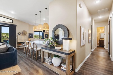 Discover this masterfully upgraded, lightly lived-in gem where