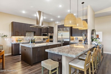 Discover this masterfully upgraded, lightly lived-in gem where