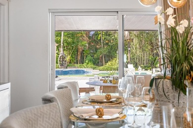 Tropical oasis in the heart of it all! This one-of-a-kind - photo 22