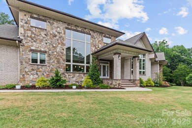 This exceptional custom-built luxury home, originally crafted as - photo 2
