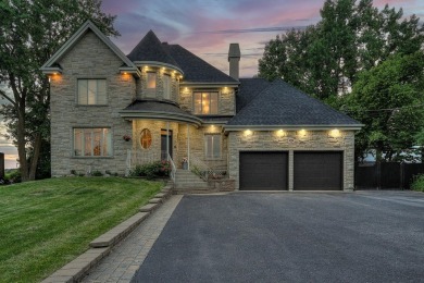 Lake Home For Sale in Saint-Basile-le-Grand, 