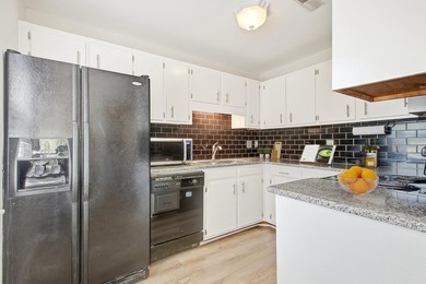 Welcome home to this charming 2-bedroom, 1.5- bath townhome in - photo 12