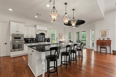 Exceptional custom-built home showcasing unique golf and lagoon - photo 14