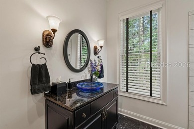 Exceptional custom-built home showcasing unique golf and lagoon - photo 30