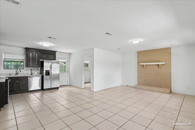 Welcome to this beautifully updated 3-bedroom, 2-bath brick home - photo 6