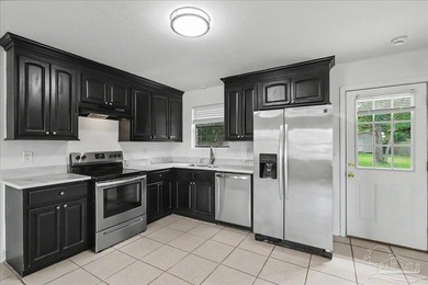 Welcome to this beautifully updated 3-bedroom, 2-bath brick home - photo 10