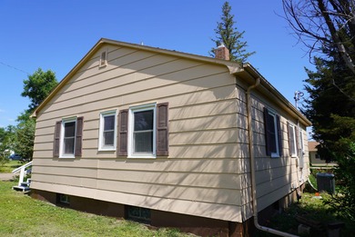 This very livable home in Newell SD has the original wood floors