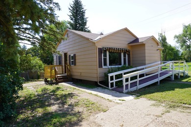This very livable home in Newell SD has the original wood floors
