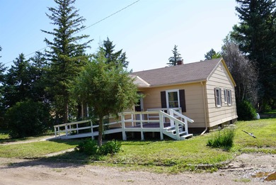 This very livable home in Newell SD has the original wood floors