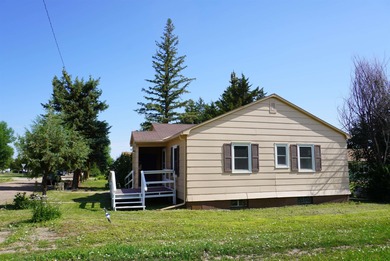 This very livable home in Newell SD has the original wood floors
