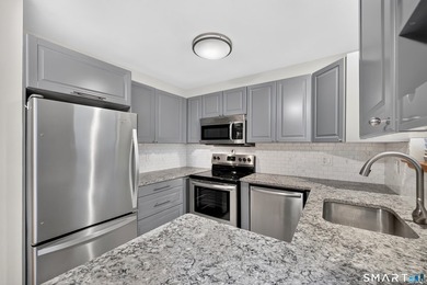 Beautifully updated 2-bedroom, 1.5-bath condo offering stylish - photo 8