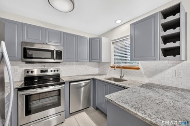 Beautifully updated 2-bedroom, 1.5-bath condo offering stylish - photo 9