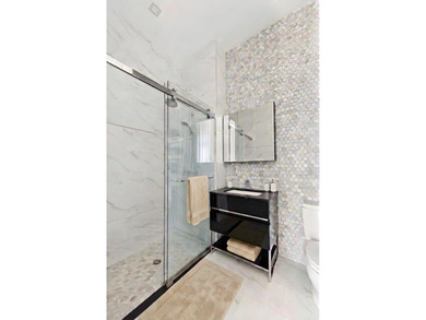 Residence 6E at 88 Withers Street is a stunning , design-forward - photo 5