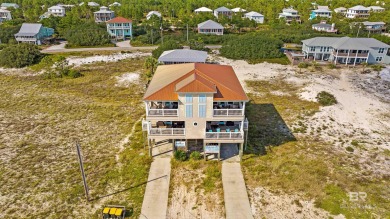 This coastal masterpiece offers unparalleled beachfront living