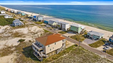 This coastal masterpiece offers unparalleled beachfront living