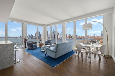 Residence 16B at Quay Tower offers exceptional waterfront living - photo 1