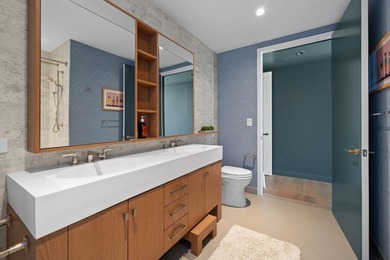 Residence 16B at Quay Tower offers exceptional waterfront living - photo 9