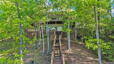 Escape to Lake Jordan in this exceptional waterfront retreat - photo 1
