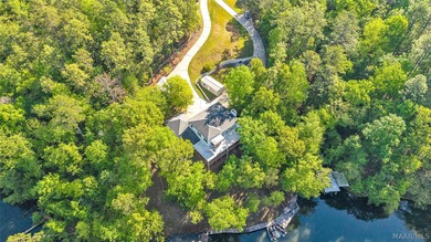 Escape to Lake Jordan in this exceptional waterfront retreat - photo 2