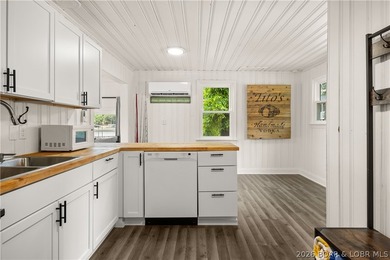 Experience premier lakefront living at its finest in Sunrise - photo 11